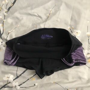 Purple and black swim or yoga bottoms